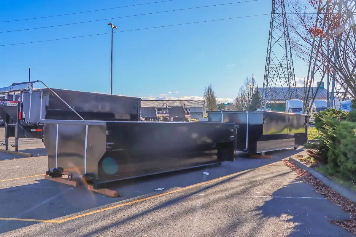 Roll-off dumpster ready for waste disposal at job site for Concrete Dumpster Rental in Robinson